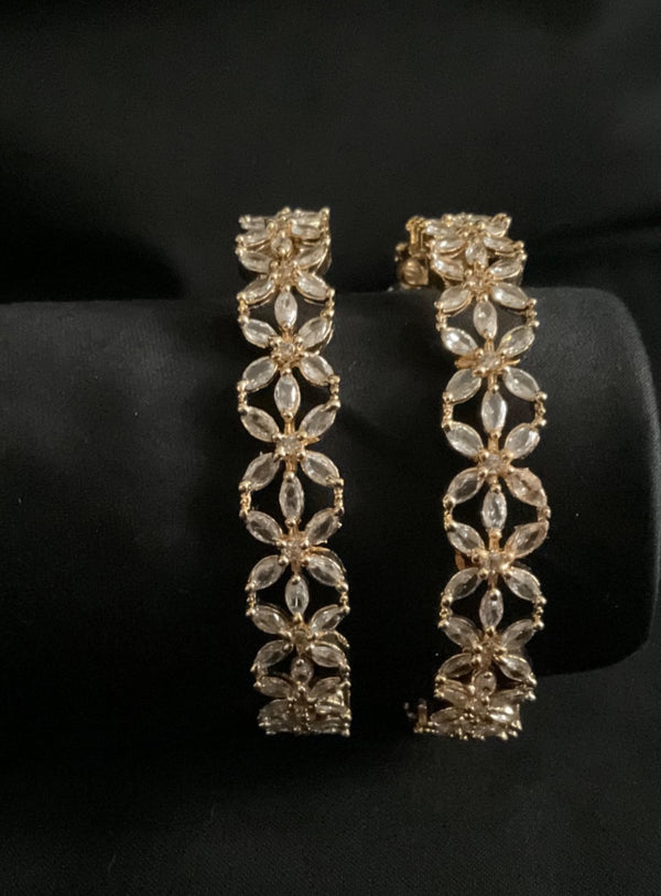 Beautiful floral design oval cut stone bangles