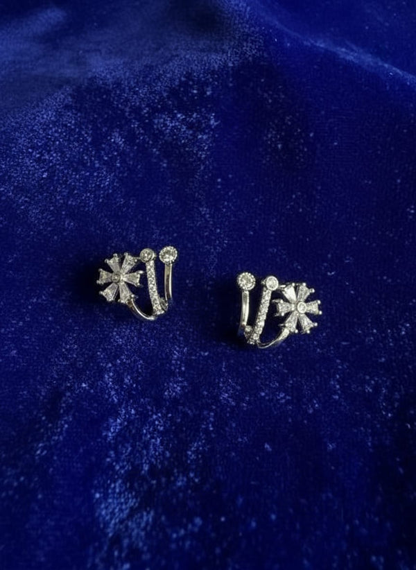 Silver flower claw stud