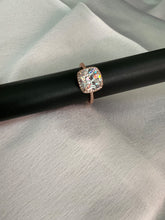 Gold shimmering  artificial  stone studded cushion cut ring