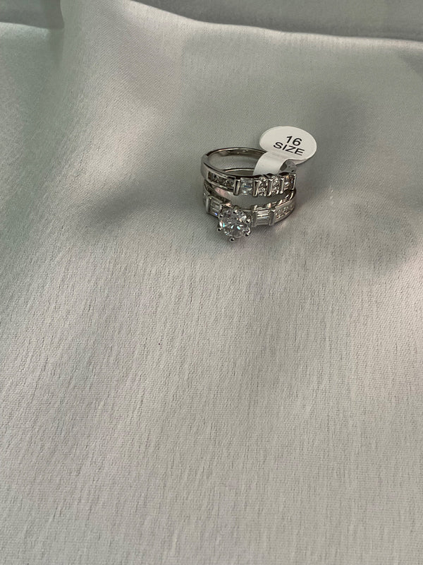 Silver engagement ring with band ring