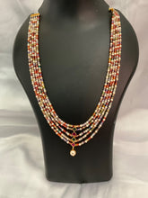 4 Layered multicolor bead necklace