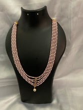 4 layered pink bead necklace