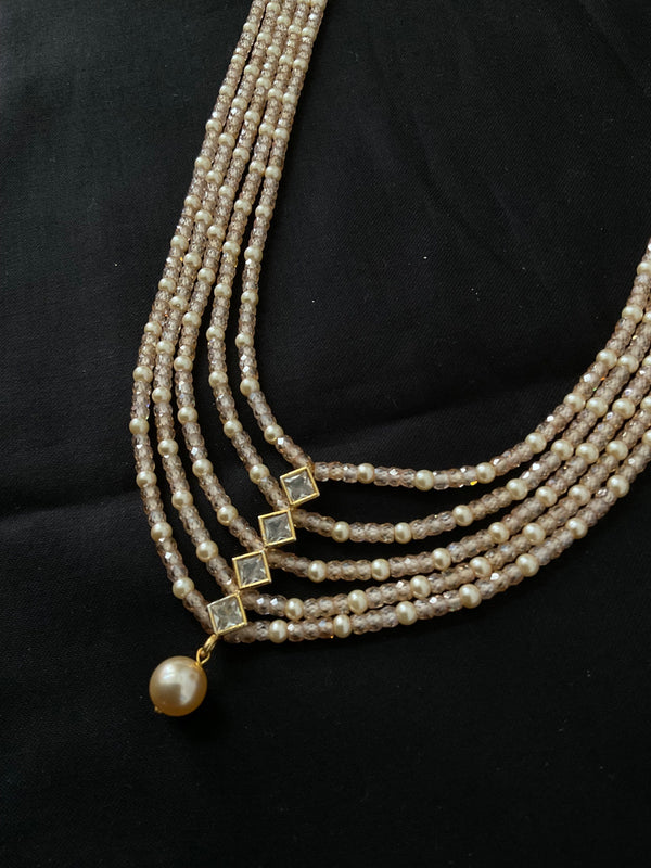 4 layered peach bead necklace